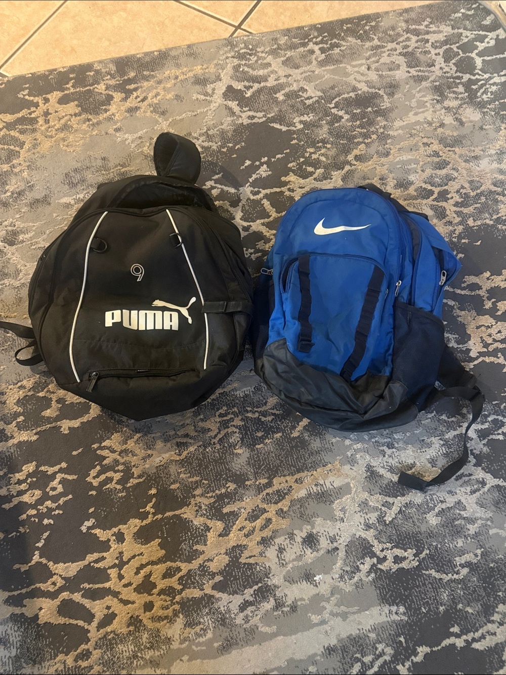 Nike and puma backpacks